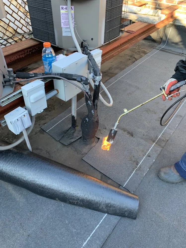 Slide of New York Seal Coating & Roofing