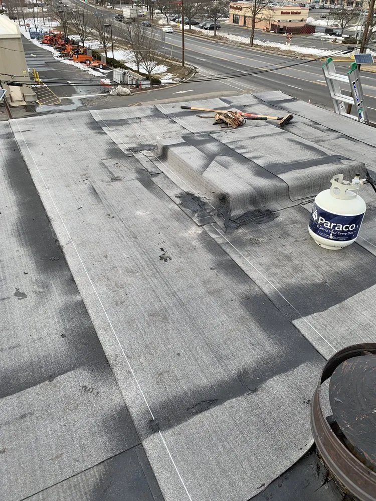 Slide of New York Seal Coating & Roofing