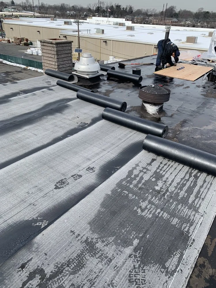Slide of New York Seal Coating & Roofing