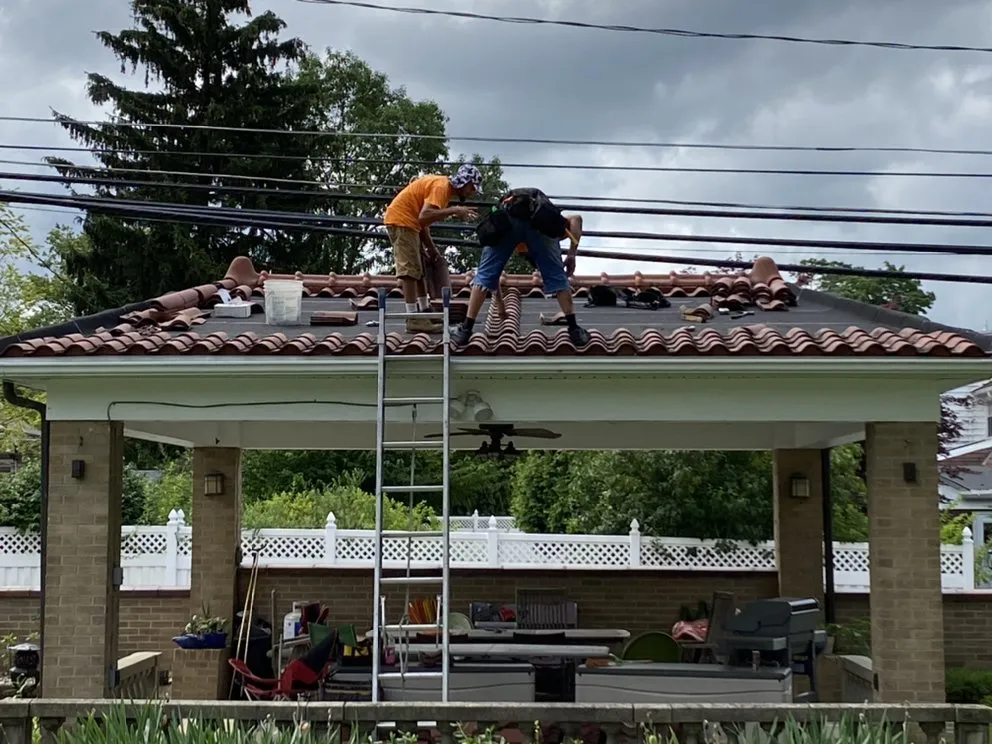 Slide of Newbonds Roofing