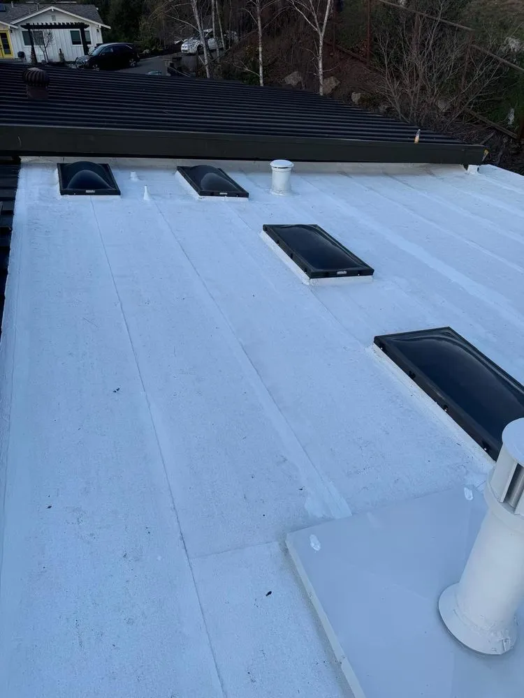 Slide of Newhaus Roofing & Construction