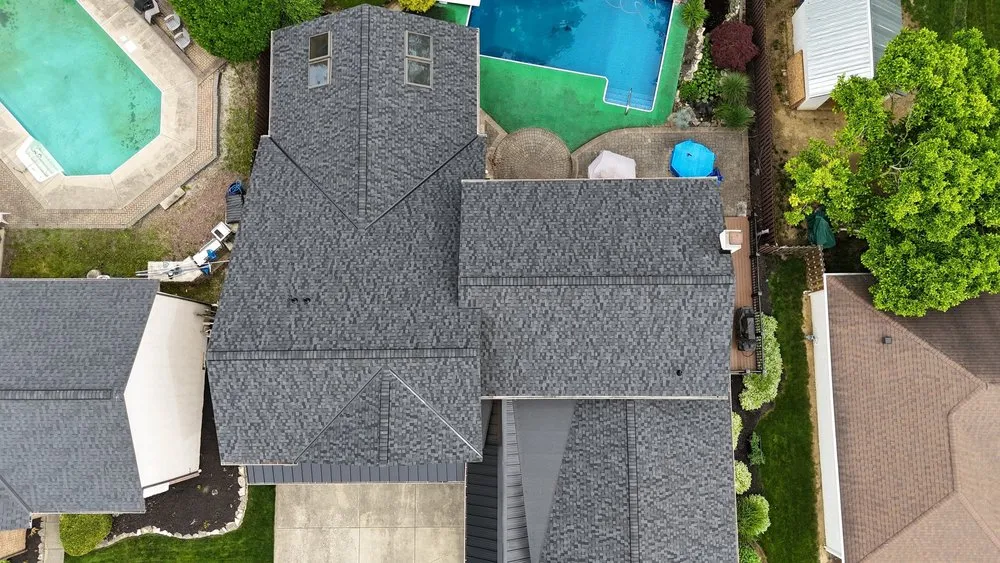 Slide of Newman Roofing