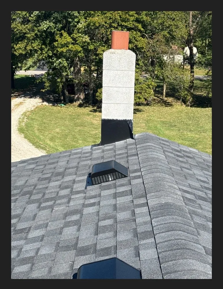 Slide of Newman Roofing