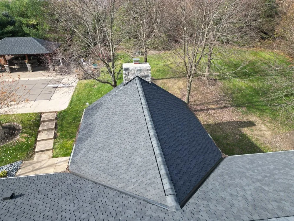 Slide of Newman Roofing