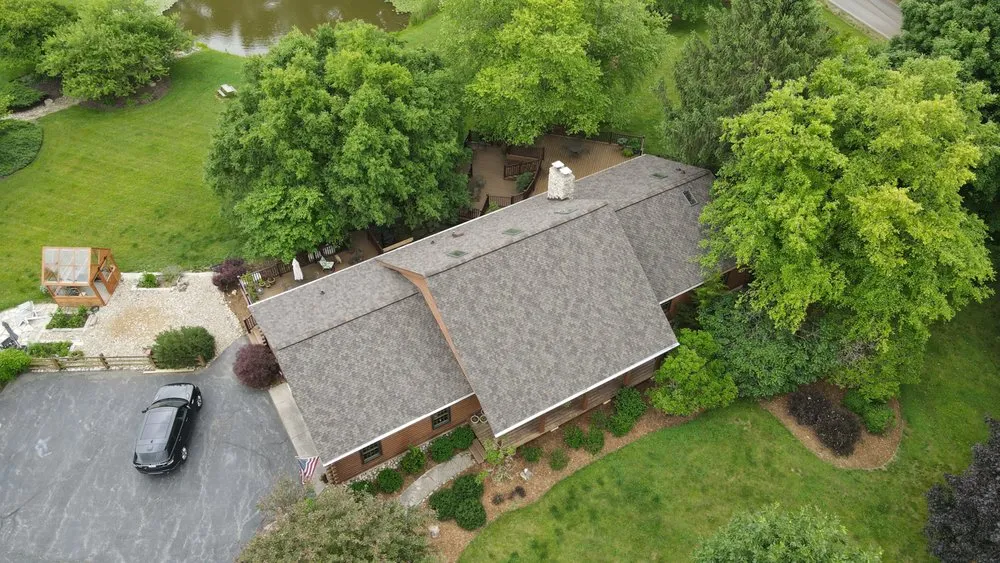 Slide of Newman Roofing