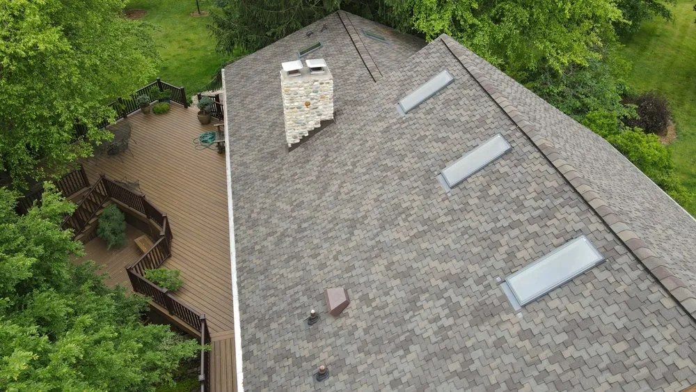 Slide of Newman Roofing