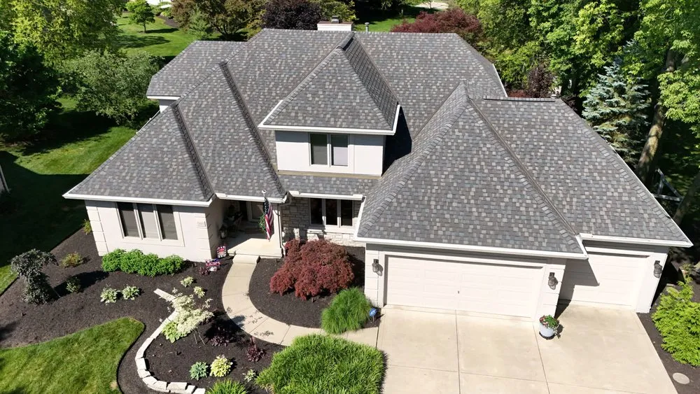 Slide of Newman Roofing