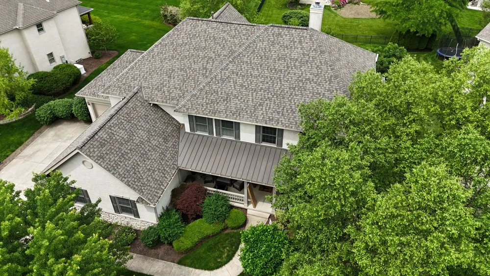 Slide of Newman Roofing