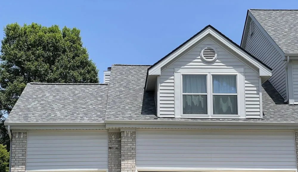 Slide of Newman Roofing