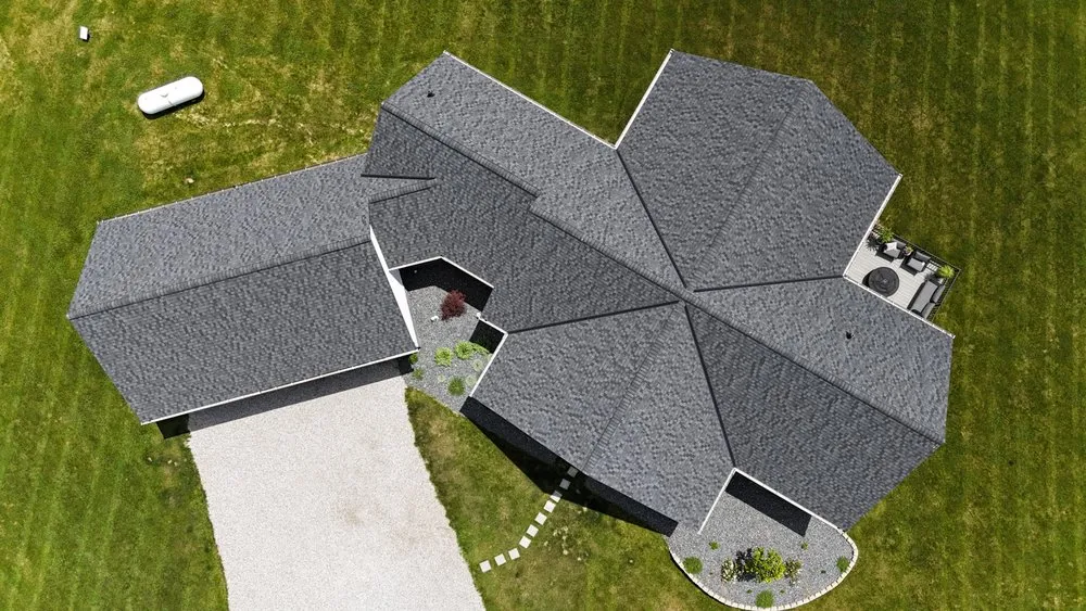 Slide of Newman Roofing