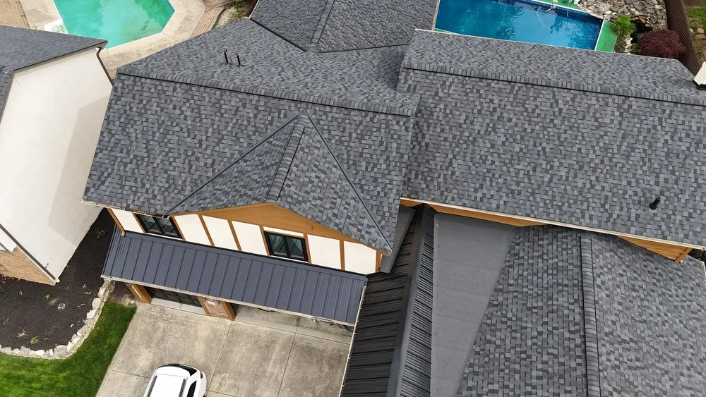 Slide of Newman Roofing