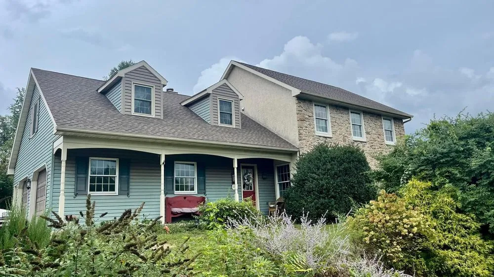 Slide of Newswanger Roofing Specialists