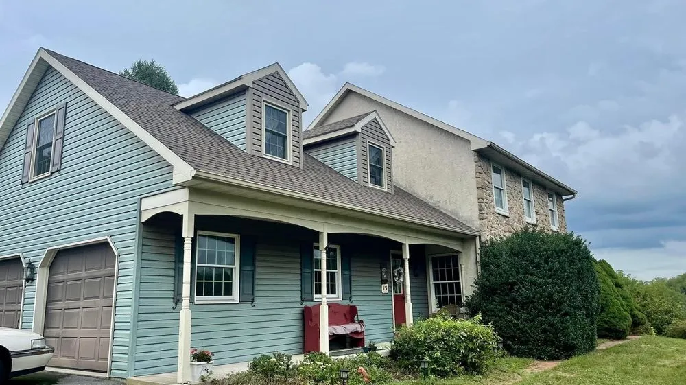 Slide of Newswanger Roofing Specialists