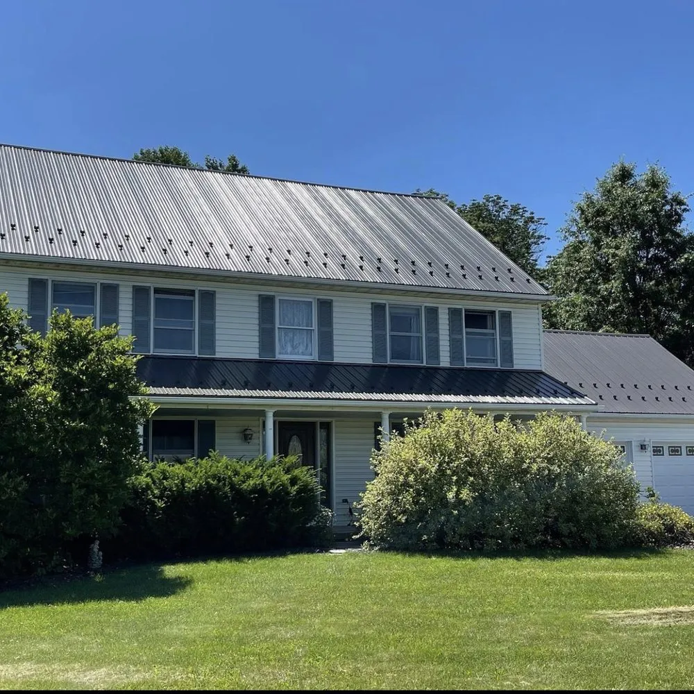 Slide of Newswanger Roofing Specialists