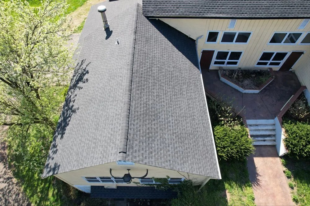 Slide of Newswanger Roofing Specialists