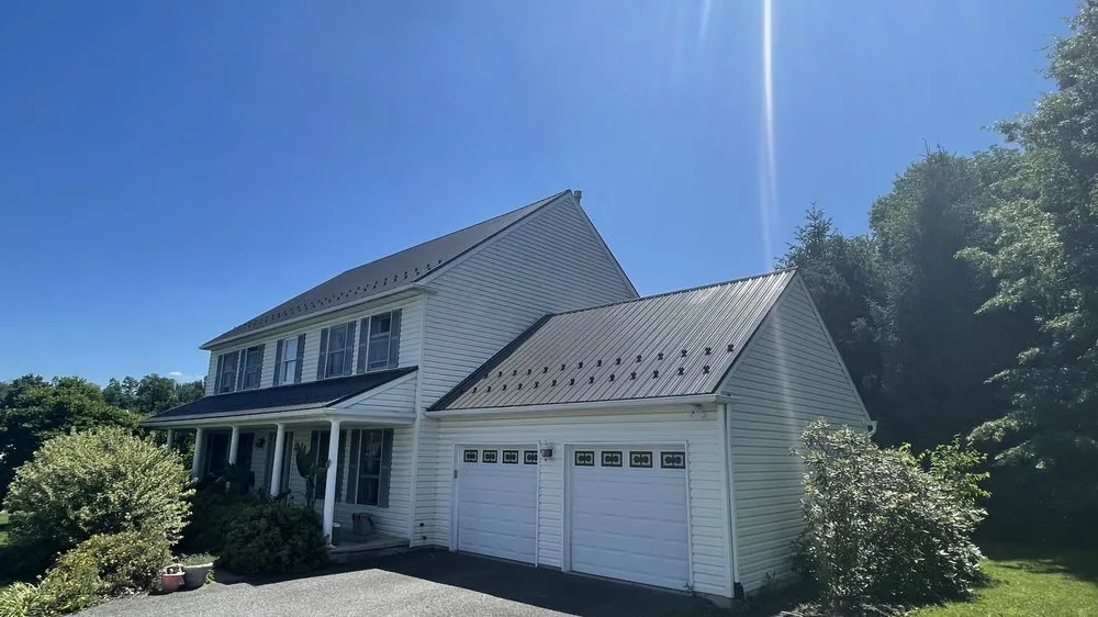 Slide of Newswanger Roofing Specialists