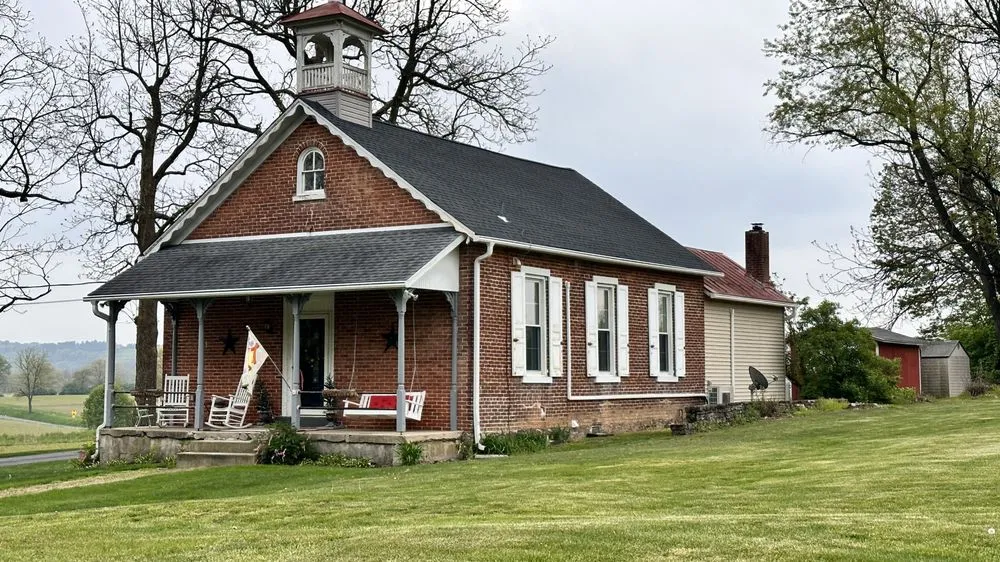 Slide of Newswanger Roofing Specialists