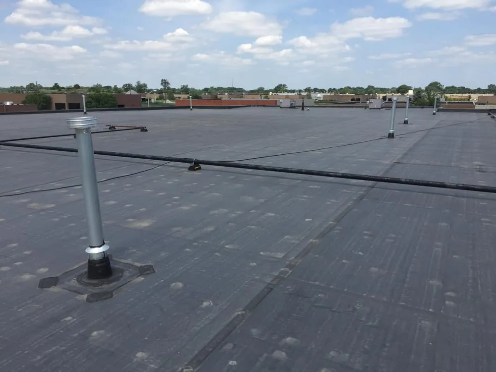 Slide of Newton Crane Roofing