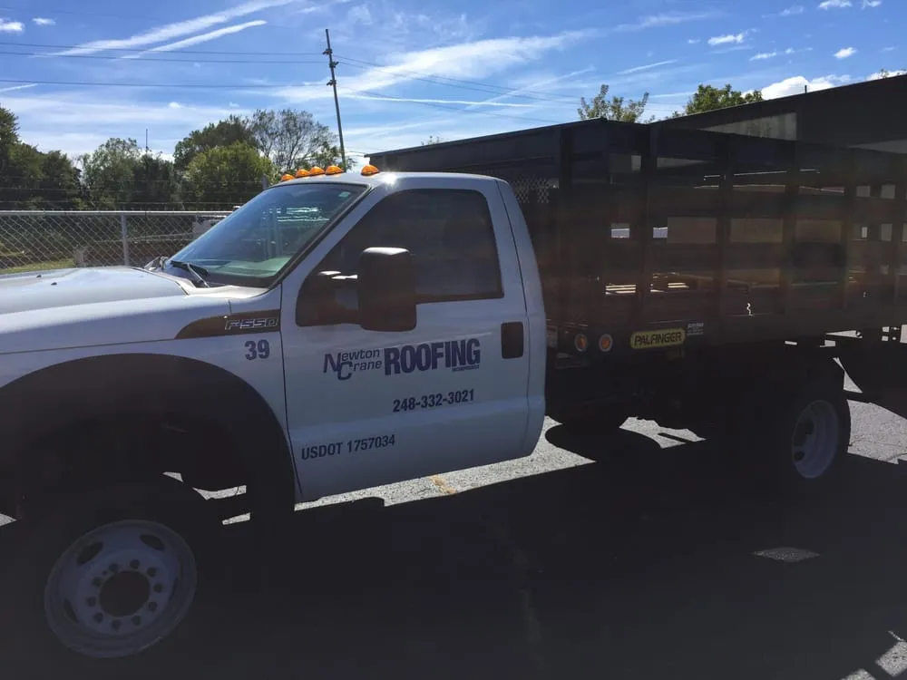 Slide of Newton Crane Roofing