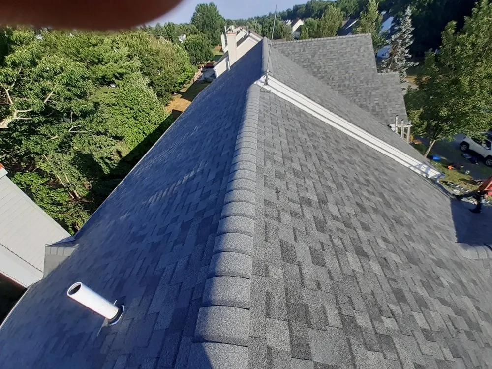 Slide of Newton Roofing