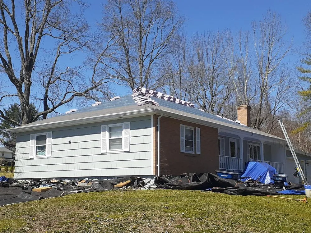 Slide of Newton Roofing