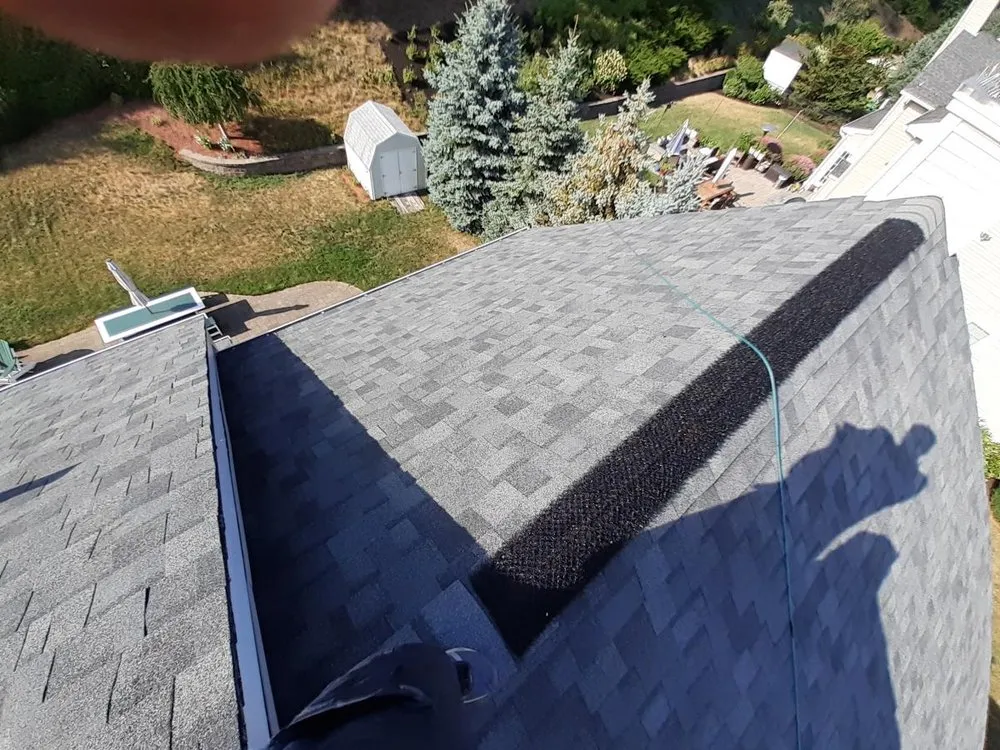 Slide of Newton Roofing