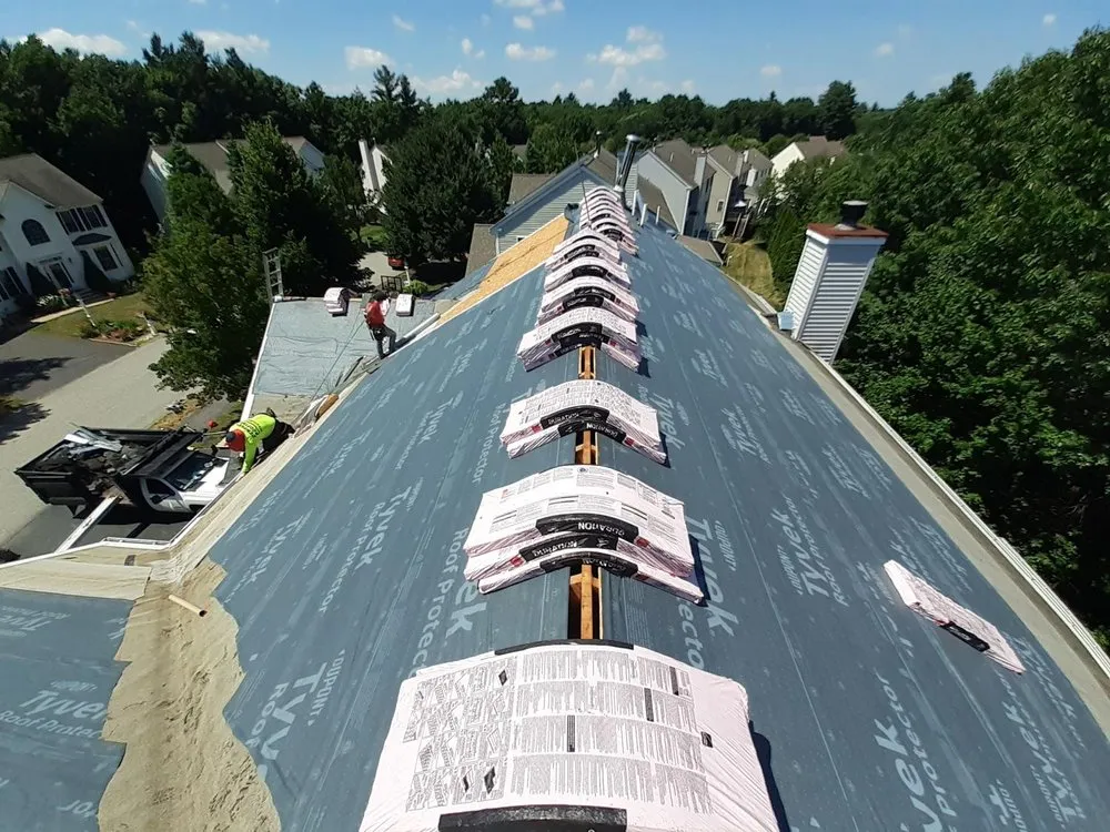 Slide of Newton Roofing