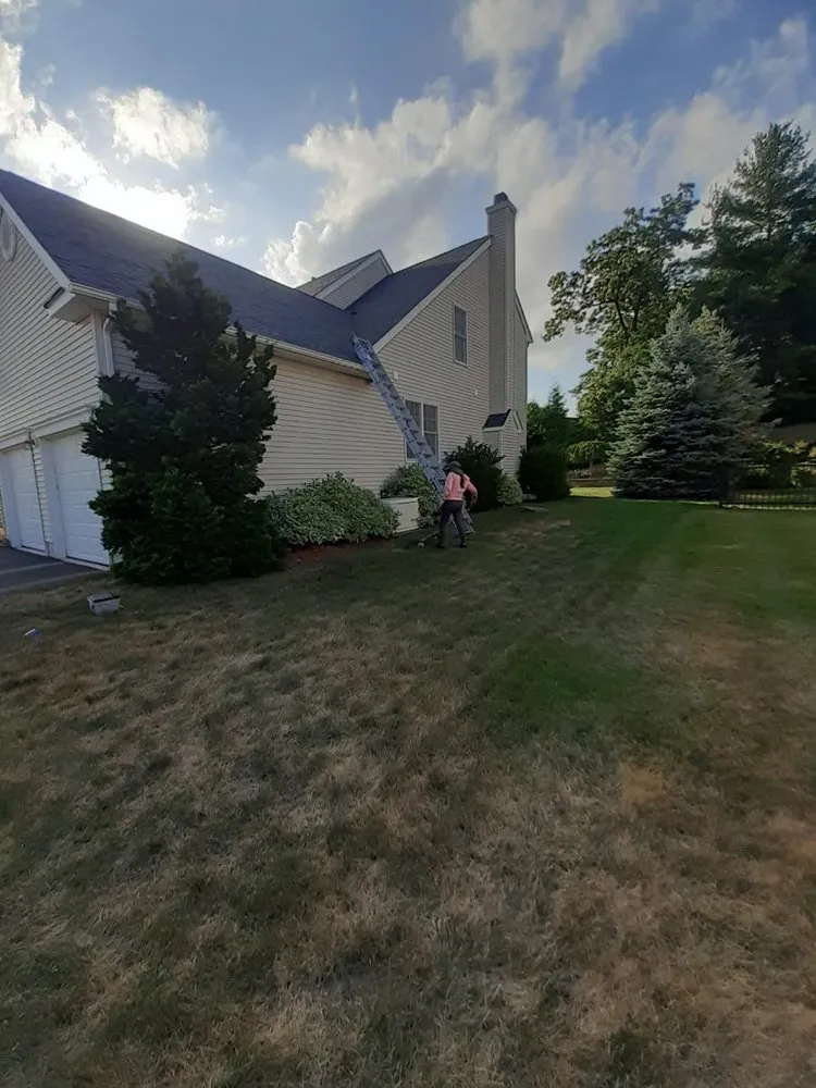 Slide of Newton Roofing