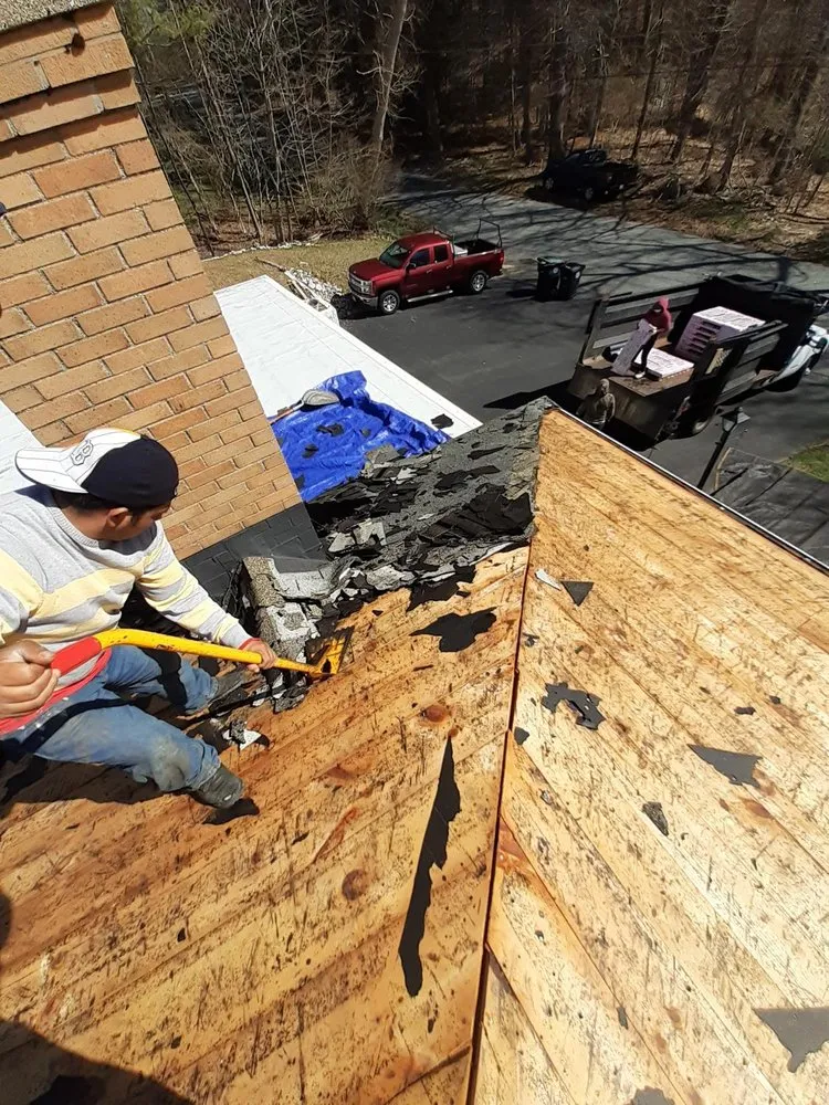 Slide of Newton Roofing