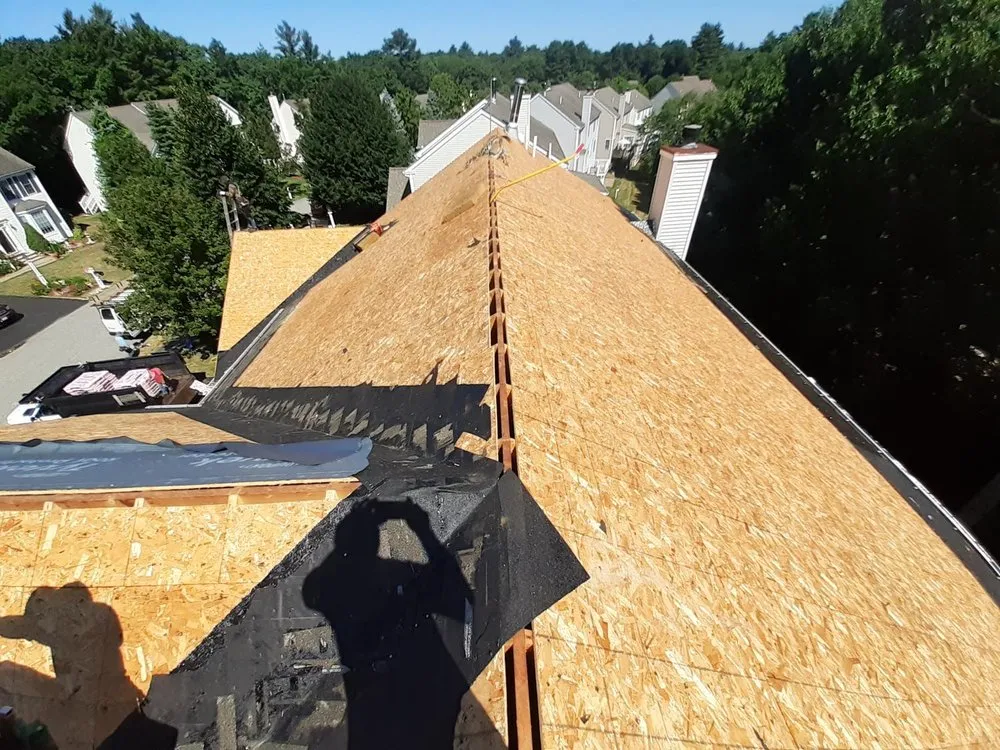 Slide of Newton Roofing