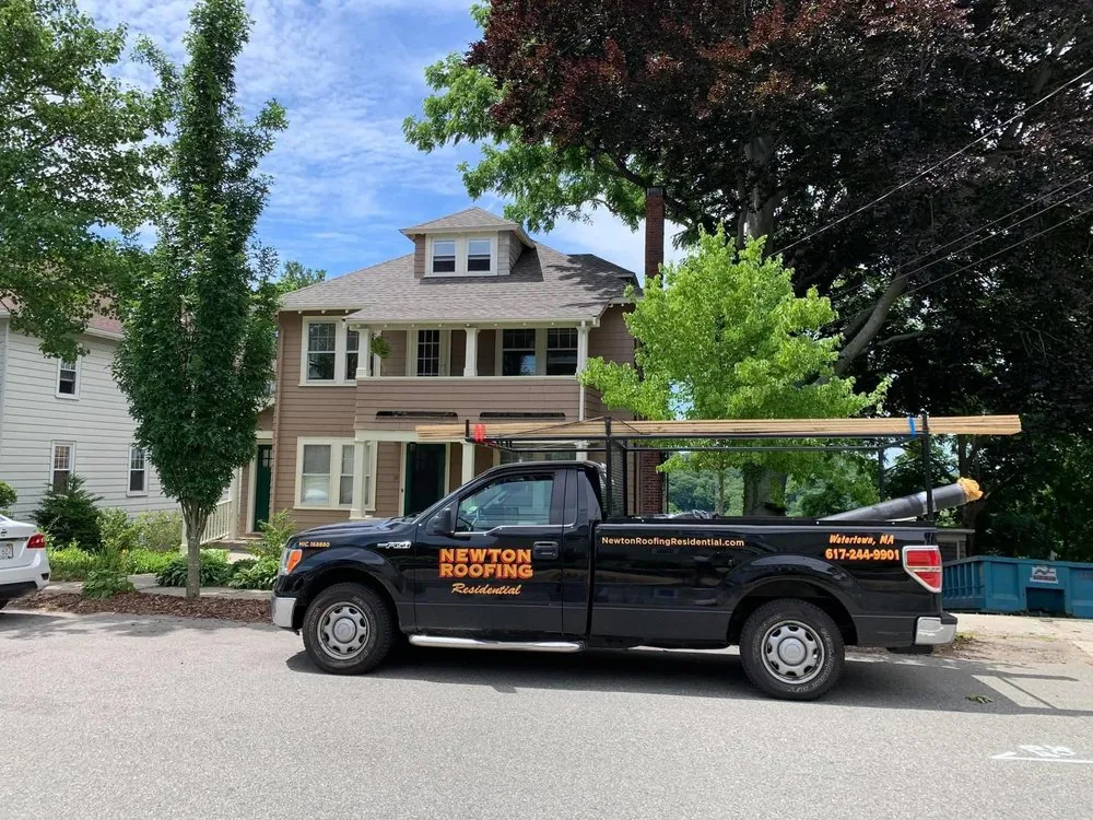 Slide of Newton Roofing Residential