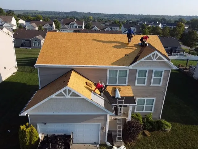 Slide of Next Day Roofing & Gutter Solutions