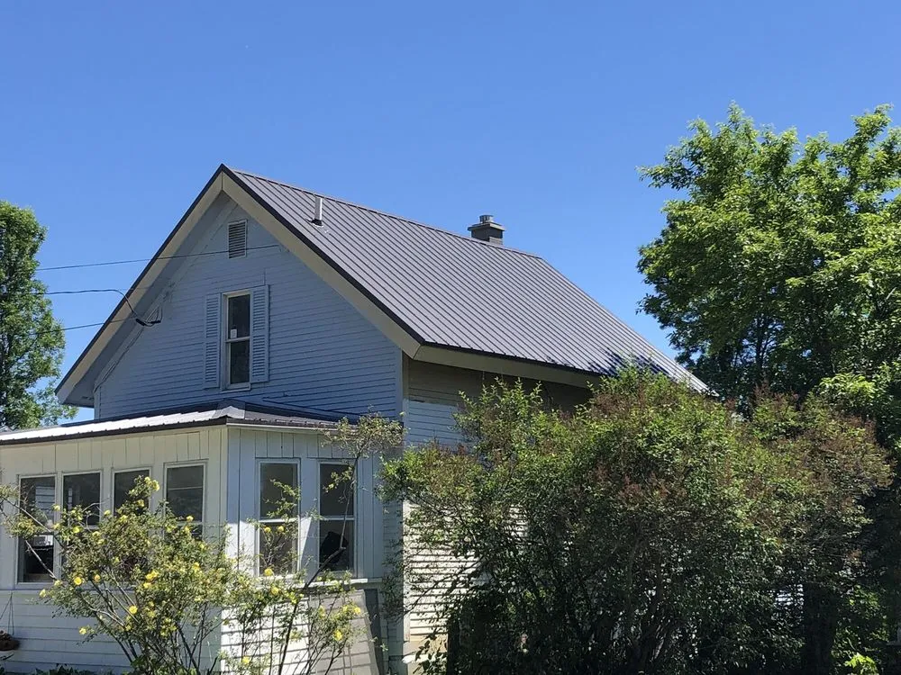 Local flat roof repair for fast service in Enosburg, VT by Next Generation Trades