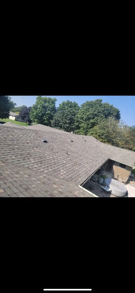 Slide of Next Level Roofing
