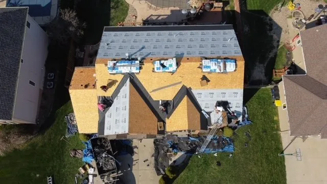 Slide of Next Level Roofing