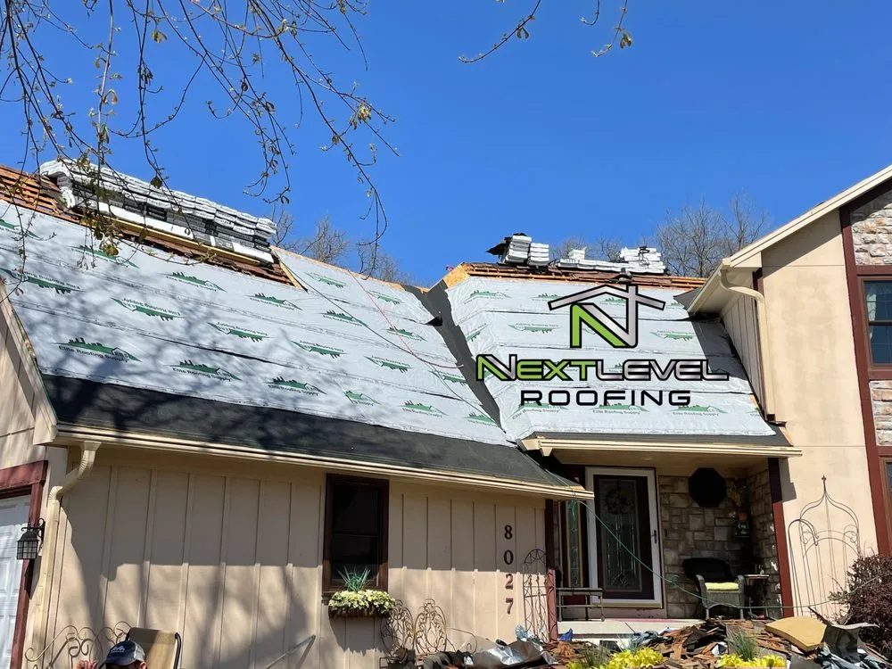 Slide of Next Level Roofing
