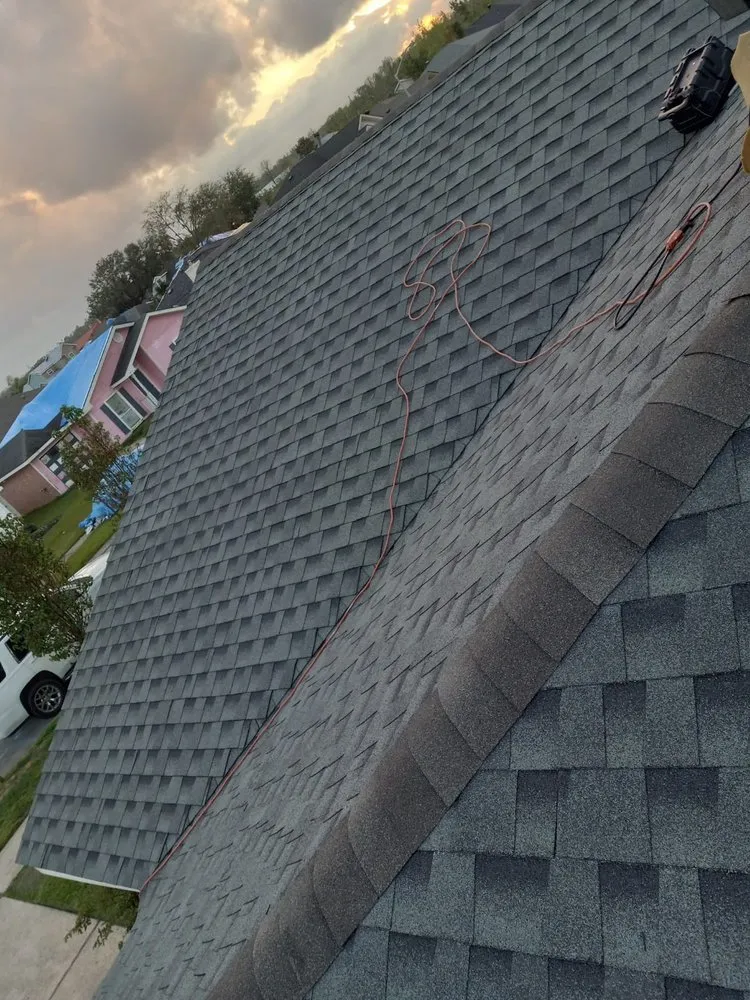 Slide of NH Rivera Roofing