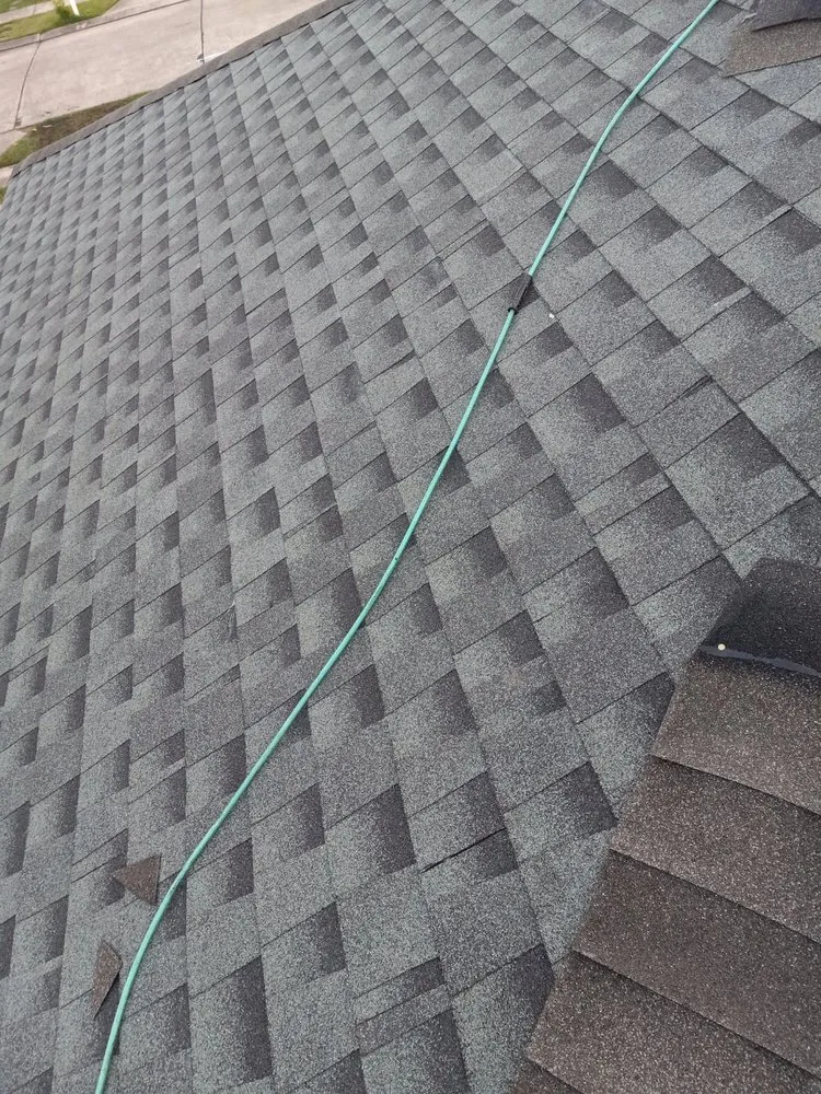 Slide of NH Rivera Roofing