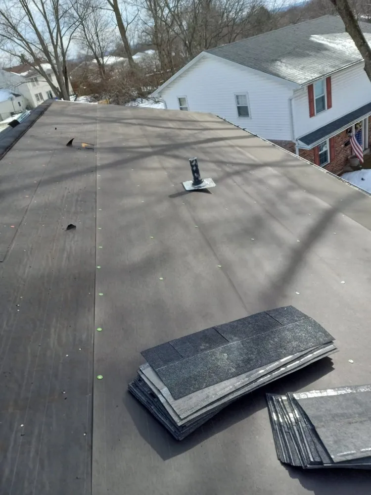 Slide of NH Rivera Roofing