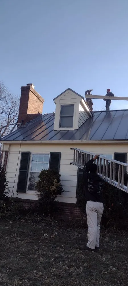 Slide of NHE Roofing