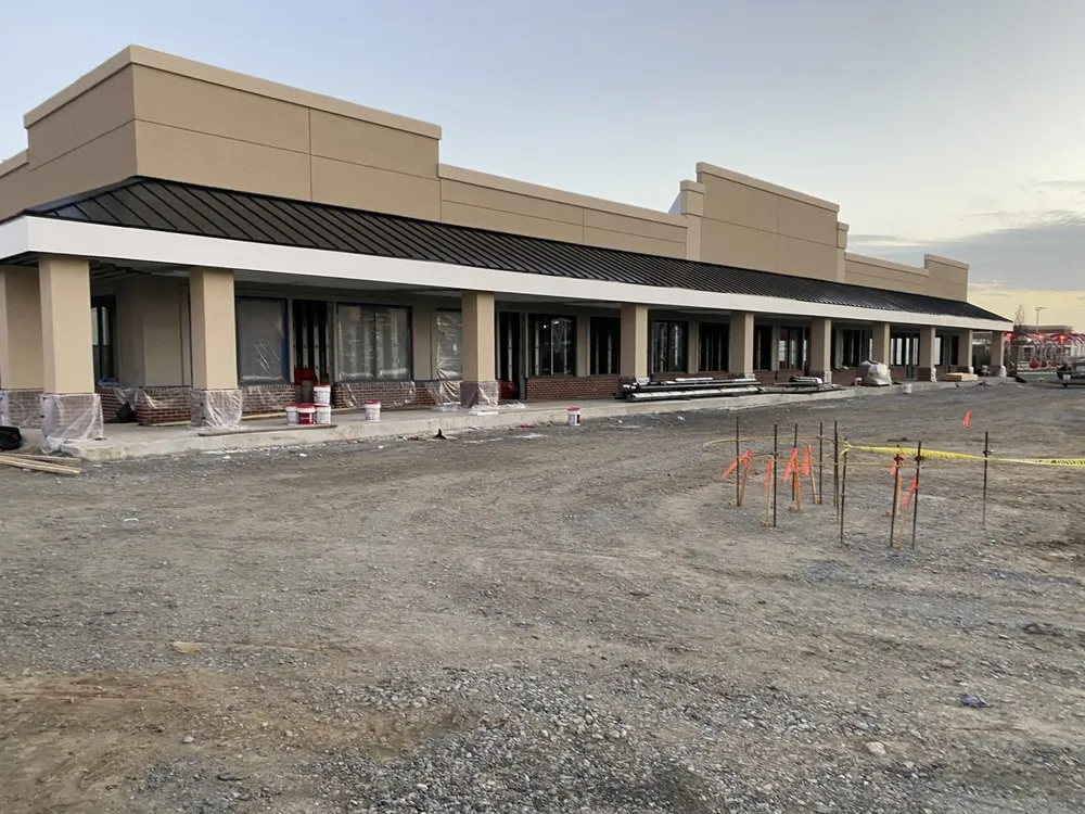 Slide of NHE Roofing