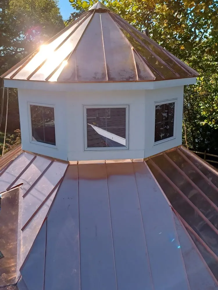 Slide of NHE Roofing