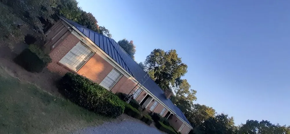 Slide of NHE Roofing