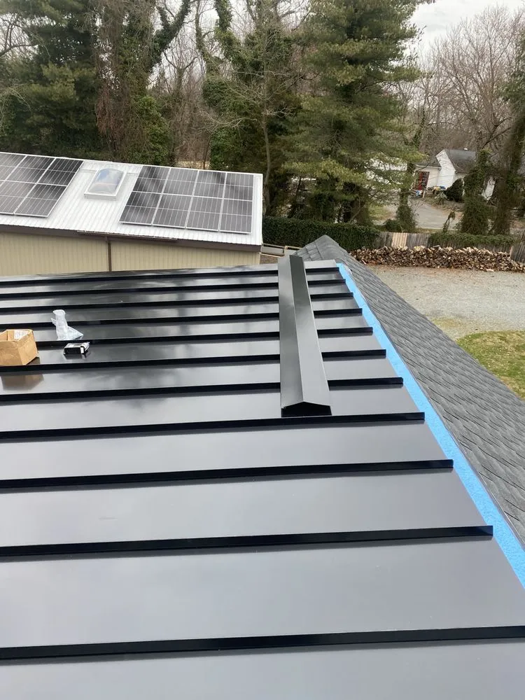 Slide of NHE Roofing