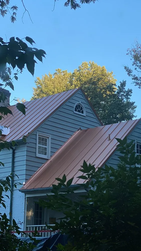 Slide of NHE Roofing