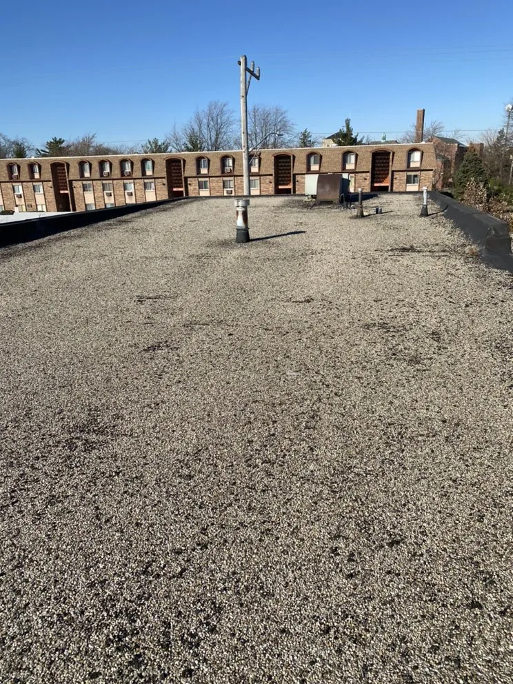 Slide of Nicholas Flat Roofing & Paving