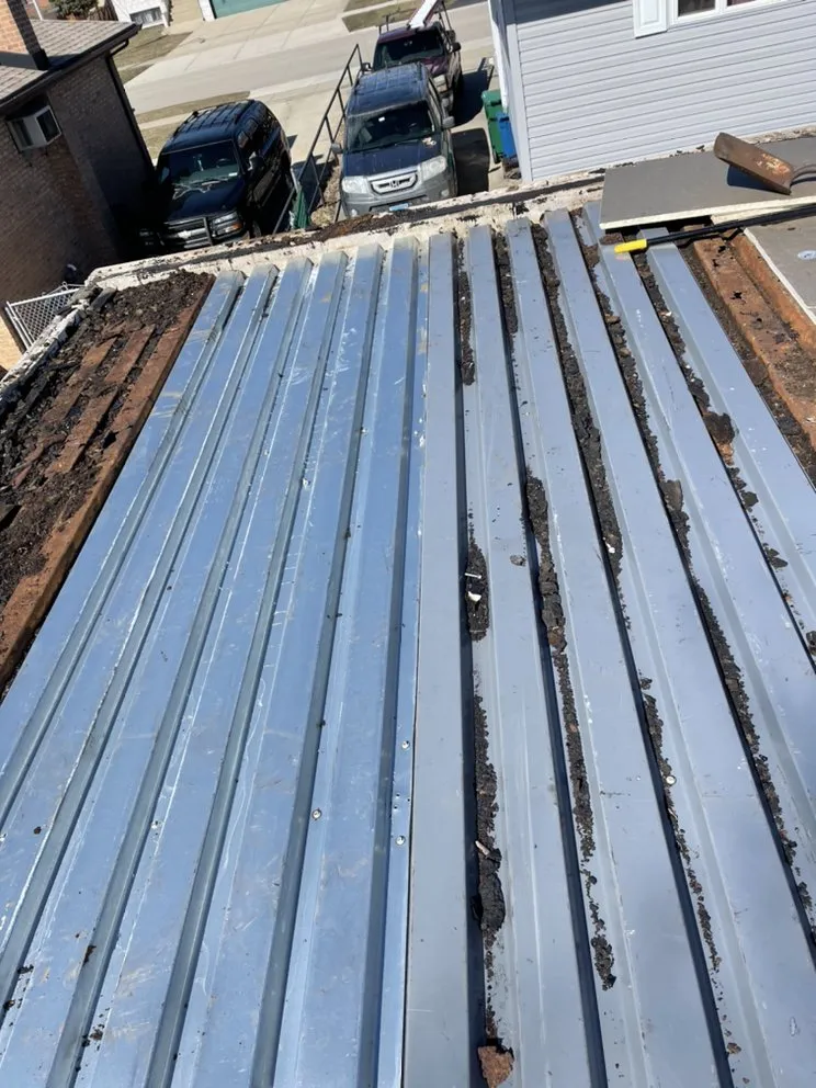 Slide of Nicholas Flat Roofing & Paving