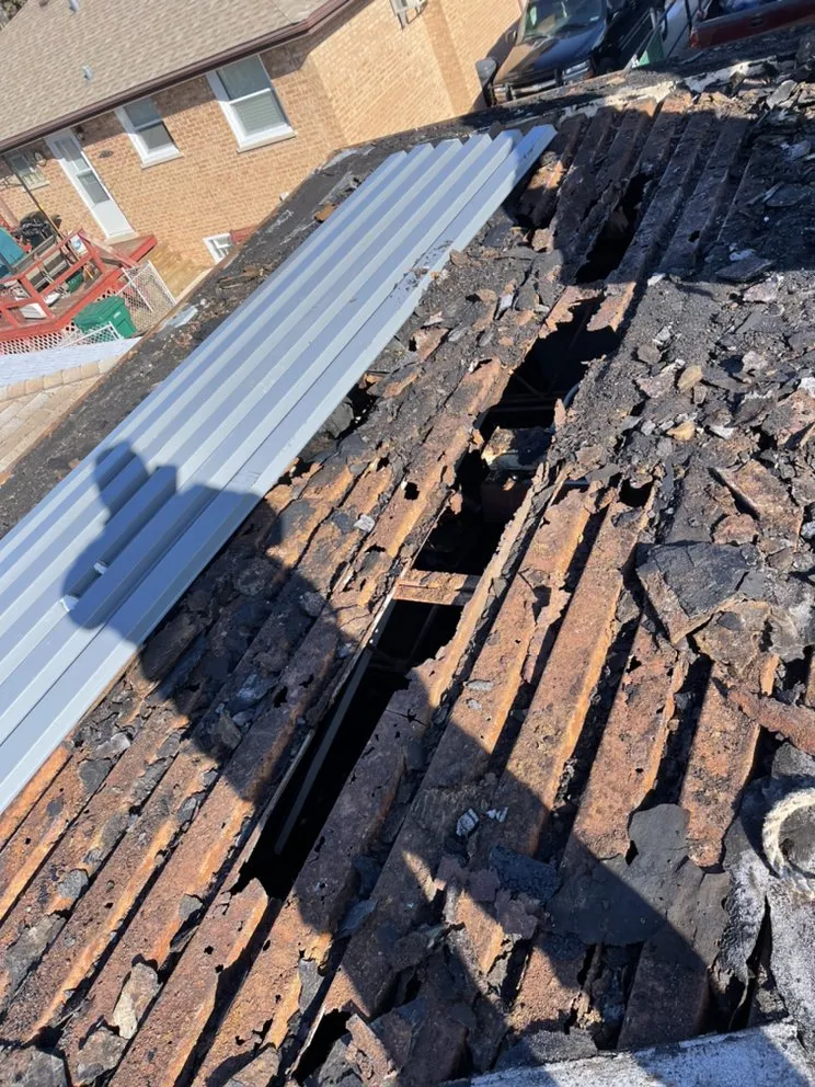 Slide of Nicholas Flat Roofing & Paving