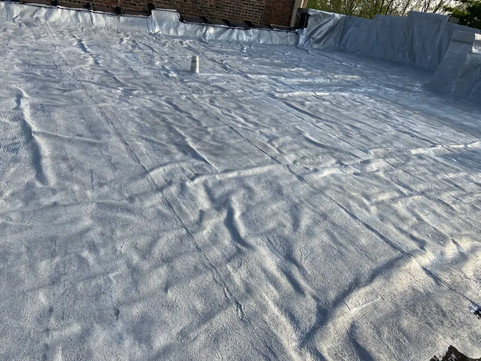 Slide of Nicholas Flat Roofing & Paving