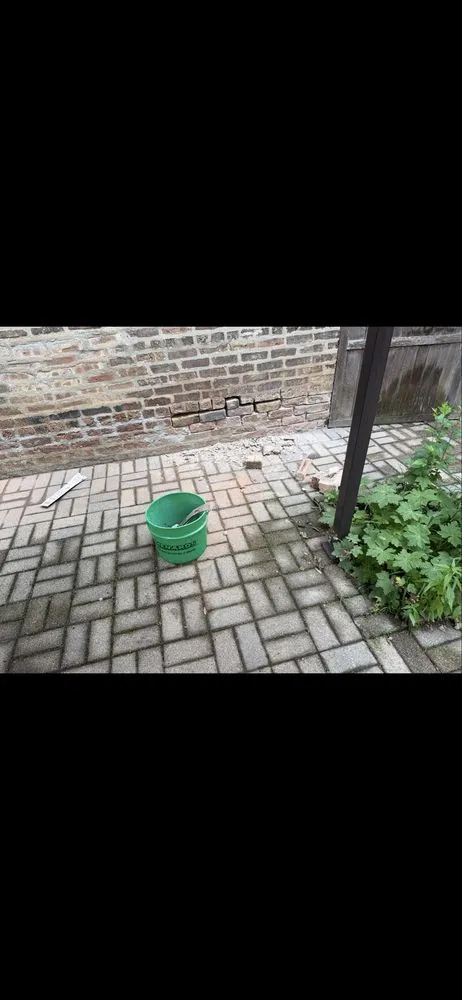 Slide of Nicholas Roofing & Tuckpointing